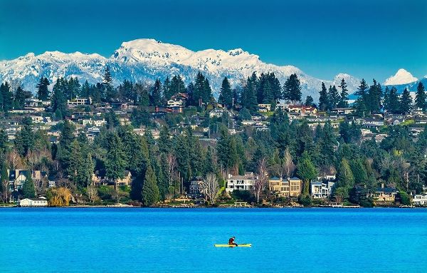 Yellow canoe and houses-Lake Washington and snowcapped Cascade Mountains-Bellevue-Washington State